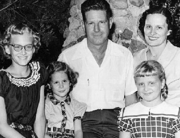 Sam and Alma Ellen Breedlove with girls, circa 1956. I have the pigtails.